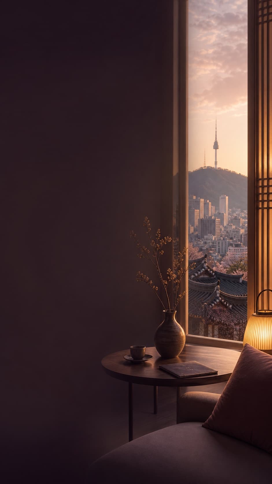 Warm Seoul lounge window view with Namsan and traditional Korean rooflines